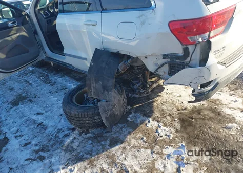 2012 Jeep Grand Cherokee Laredo z USA, uszkodzony, nr VIN 1C4RJFAG7CC256142